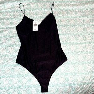 Timing BUCKLE Brand black bodysuit NWT